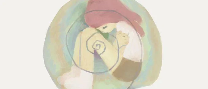 girl curled up inside of a sea shell 