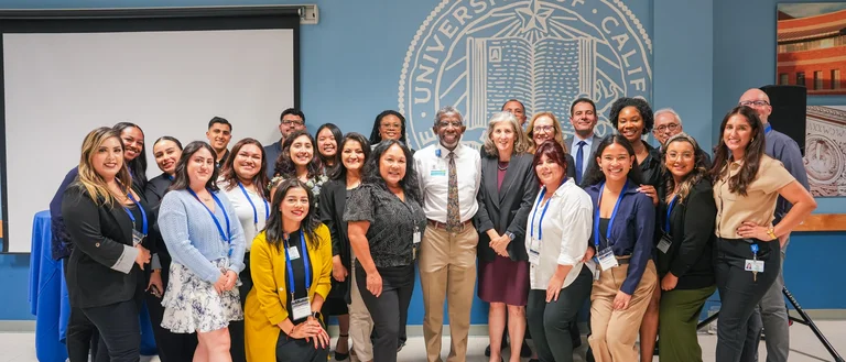 Dr. Abel and Dr. Currier with DOM admin staff at Research Day 2024 