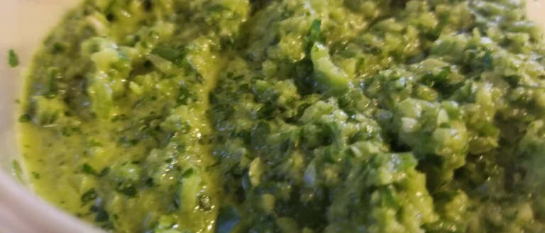 Sofrito is a green salsa made with chilis, olives, garlic, onion, and herbs