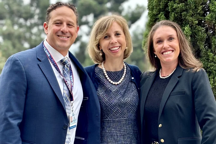 executive search team which include three people (two women and one man)