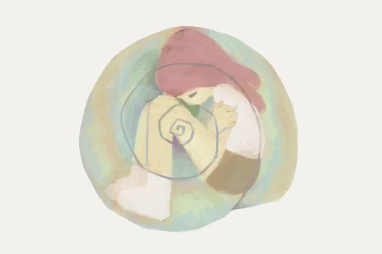 girl curled up inside of a sea shell 