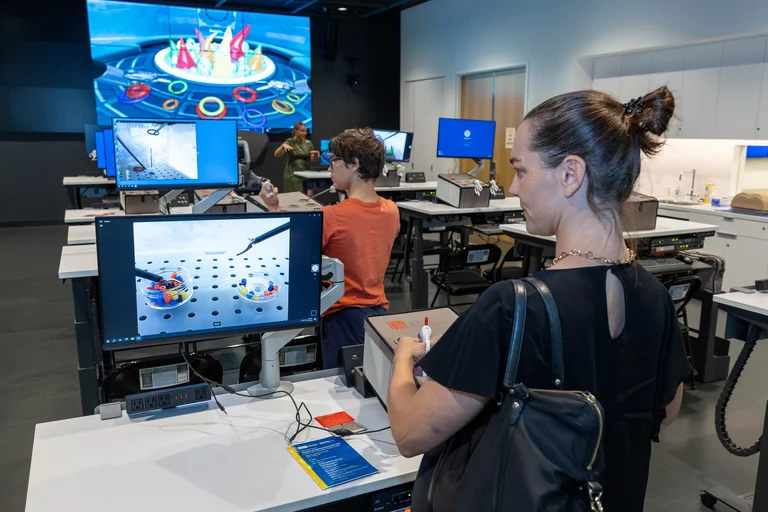 medical students learning in a simulation center