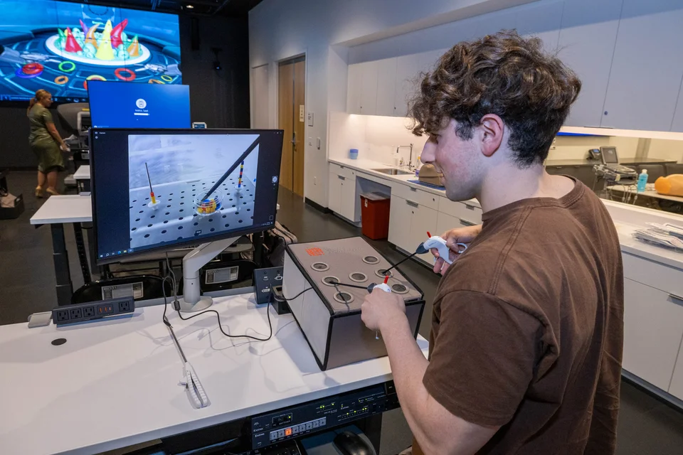 Student training on a simulator device.
