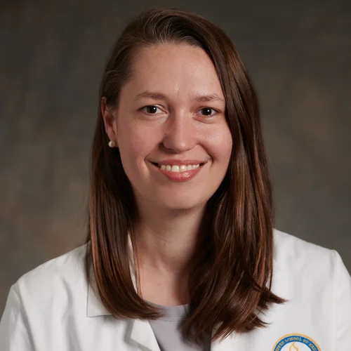 Jennifer J Chia, MD, PhD, facing forwarding, wearing a white lab coat