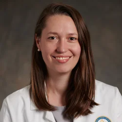 Jennifer J Chia, MD, PhD, facing forwarding, wearing a white lab coat