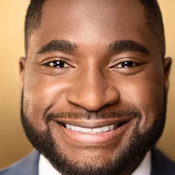 Photo is face of Dr. Utibe Essien, who is a black man with a beard.