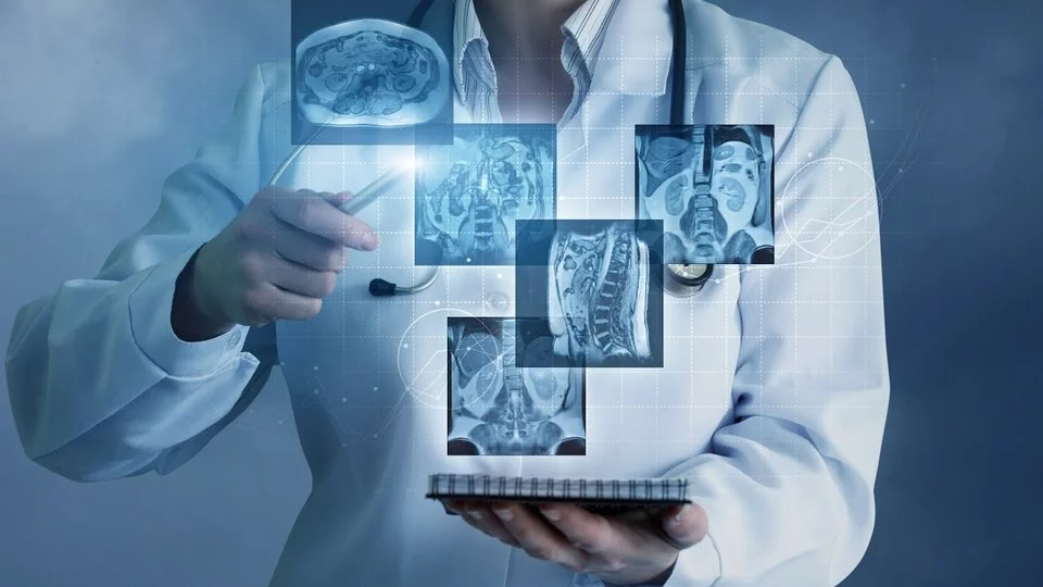 Doctor holding x-rays