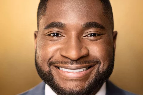 Photo is face of Dr. Utibe Essien, who is a black man with a beard.